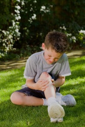 Boy with cut on his knee