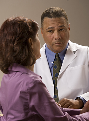 Doctor talking with patient.