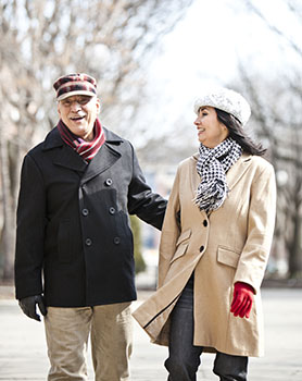 Man and woman walking  in winter.