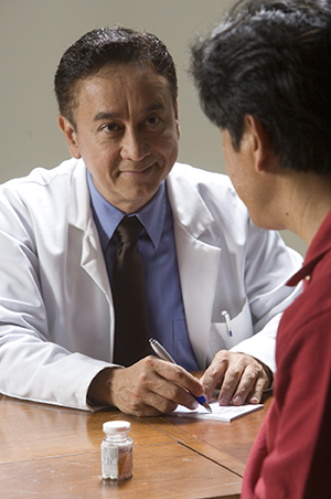 Man talking to doctor.