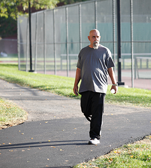 Man walking in park.