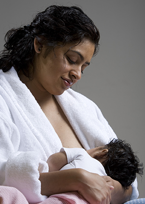 Woman breastfeeding baby.