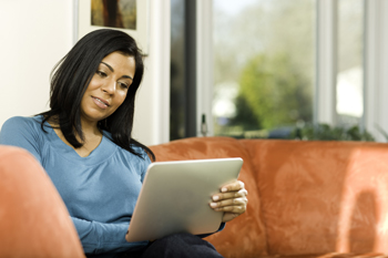 Woman reading an electronic tablet