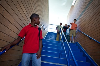 Young teens on the stairs at a school