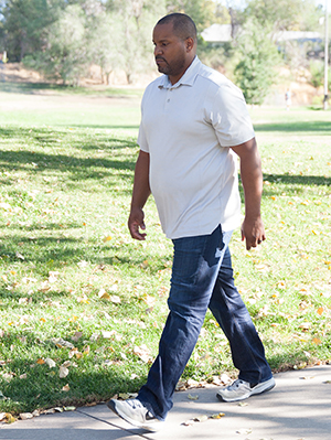 Man walking outdoors.