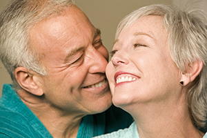 Man and woman laughing.