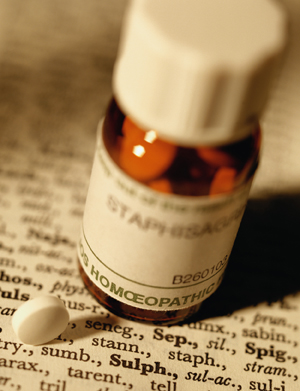 Close-up of a bottle of homoeopathic medication.