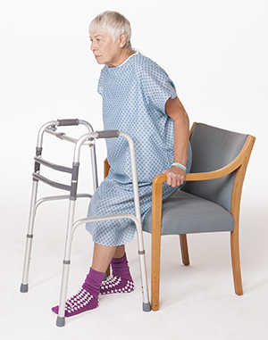 https://api.kramesstaywell.com/Content/6066ca30-310a-4170-b001-a4ab013d61fd/ucr-images-v1/Images/woman-in-hospital-gown-sitting-down-in-chair-with-walker-in-front-of-her-3