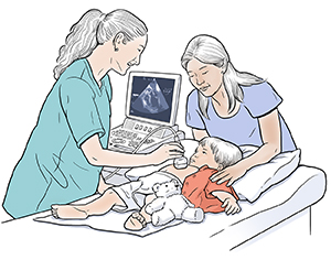 Boy lying on exam table as healthcare provider performs echocardiogram on him.  Woman is standing next to table.